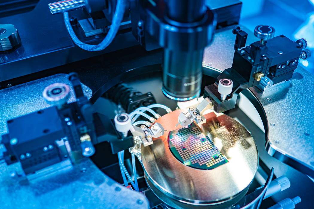 Automated pick-and-place machine assembling miniature printed circuit boards
